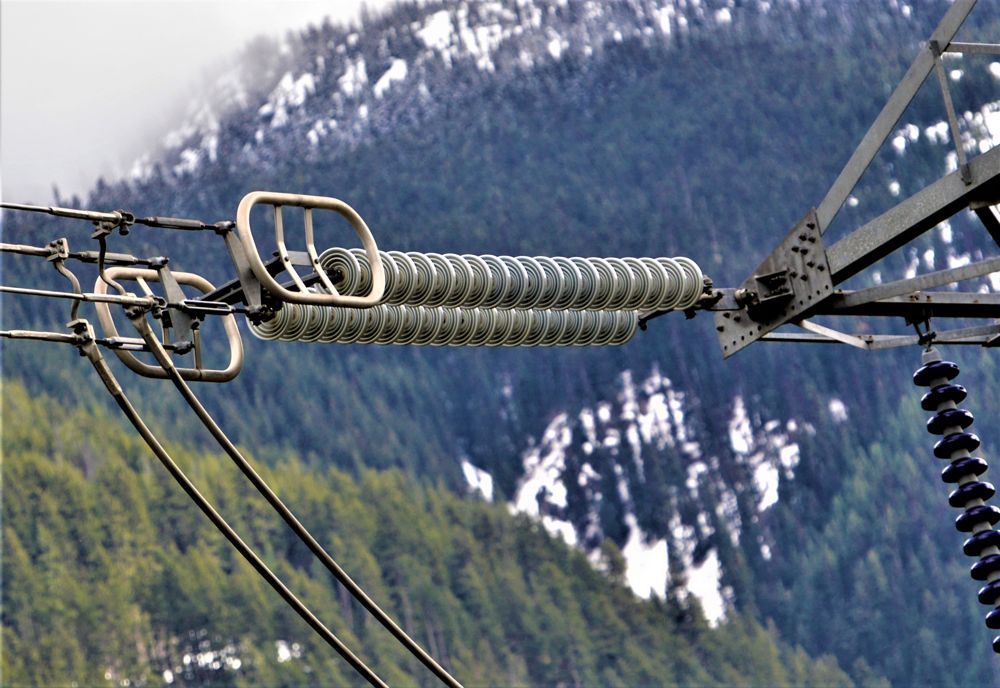 Electrical worker in sunset